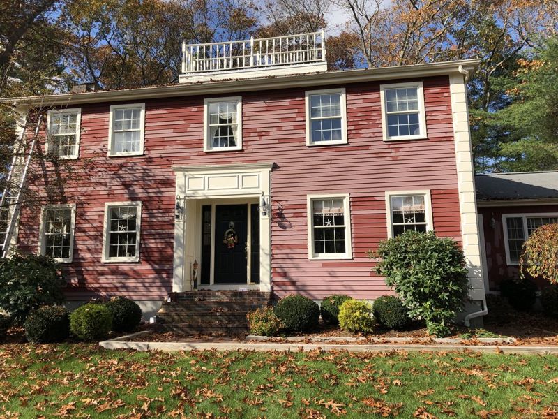 Colonial house exterior before repainting (Before)