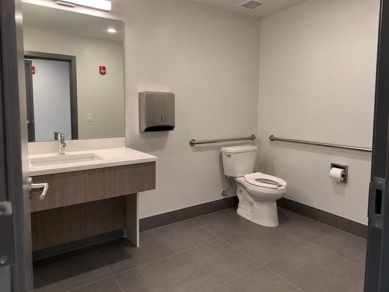 Commercial restroom with freshly painted walls