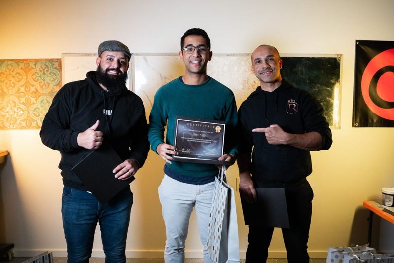 Israel Duarte with his New Classic Decorative Finishes Workshop certificate